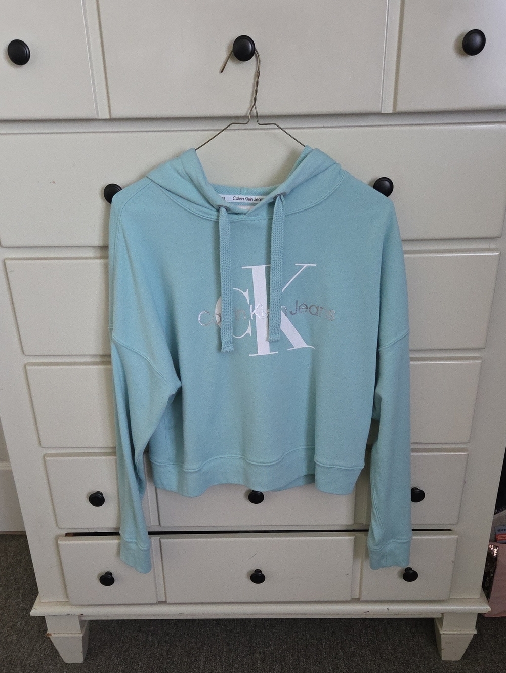 Calvin Klein Jeans Cropped Light Blue Hoodie with White CK Logo